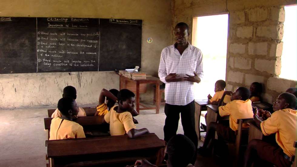 teacher and pupils in class
