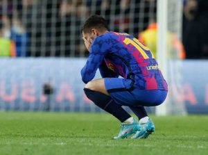 Ferran Torres buried his face in his palms after the final whistle in Barcelona's 1-1 draw with Napoli at the Nou Camp in a Europa League play-off on February 17