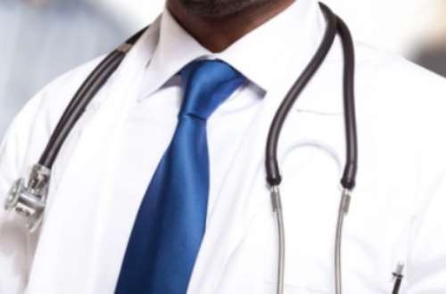 picture of a Physician assitant in a lab coat and stethoscope