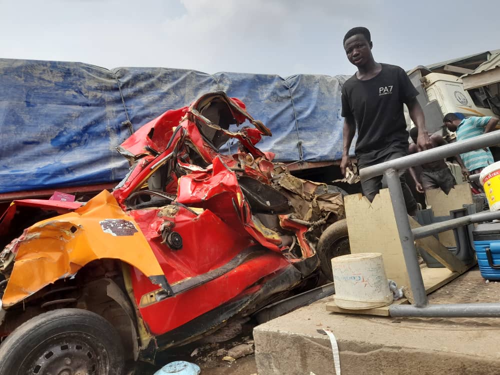one of crashed taxis at the accident scene at Nsawam