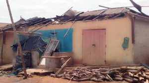 house damaged by rainstorm