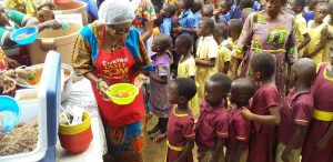Caterers serving food to school children under the school feeding programme