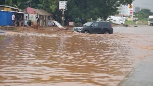 a car moving through a flooded road