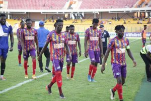 Hearts of Oak players walk off the field after a match