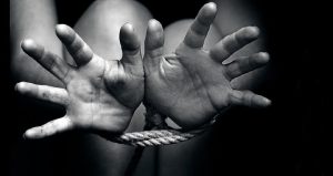 person's hands tied