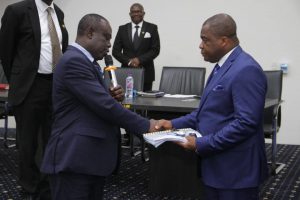 Dr Stephen Wengam being handed over to by Rev Paul Frimpong Manso as Superintendent of the Assemblies of God Church Ghana