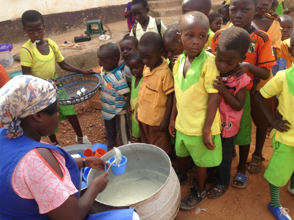 School children queue for food