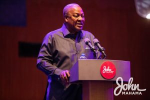 John Mahama speaking at the Building the Ghana We Want event the UPSA Auditorium