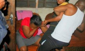woman separating a man from another woman