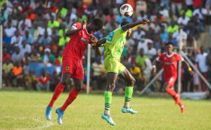 Bechem United and Kotoko players jump to head a ball during the GPL Week 2 encounter on November 3,United won 2-0