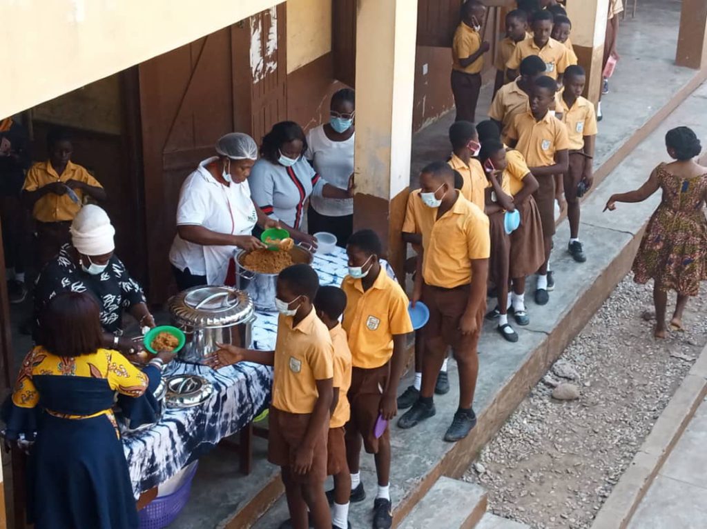 Pupils queue for food in school
